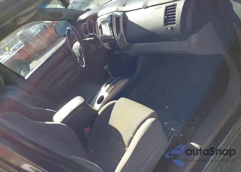 2013 Toyota Tacoma Base V6 z USA, uszkodzony, nr VIN 3TMLU4EN9DM123294